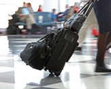 Airport Terminal and Travellers